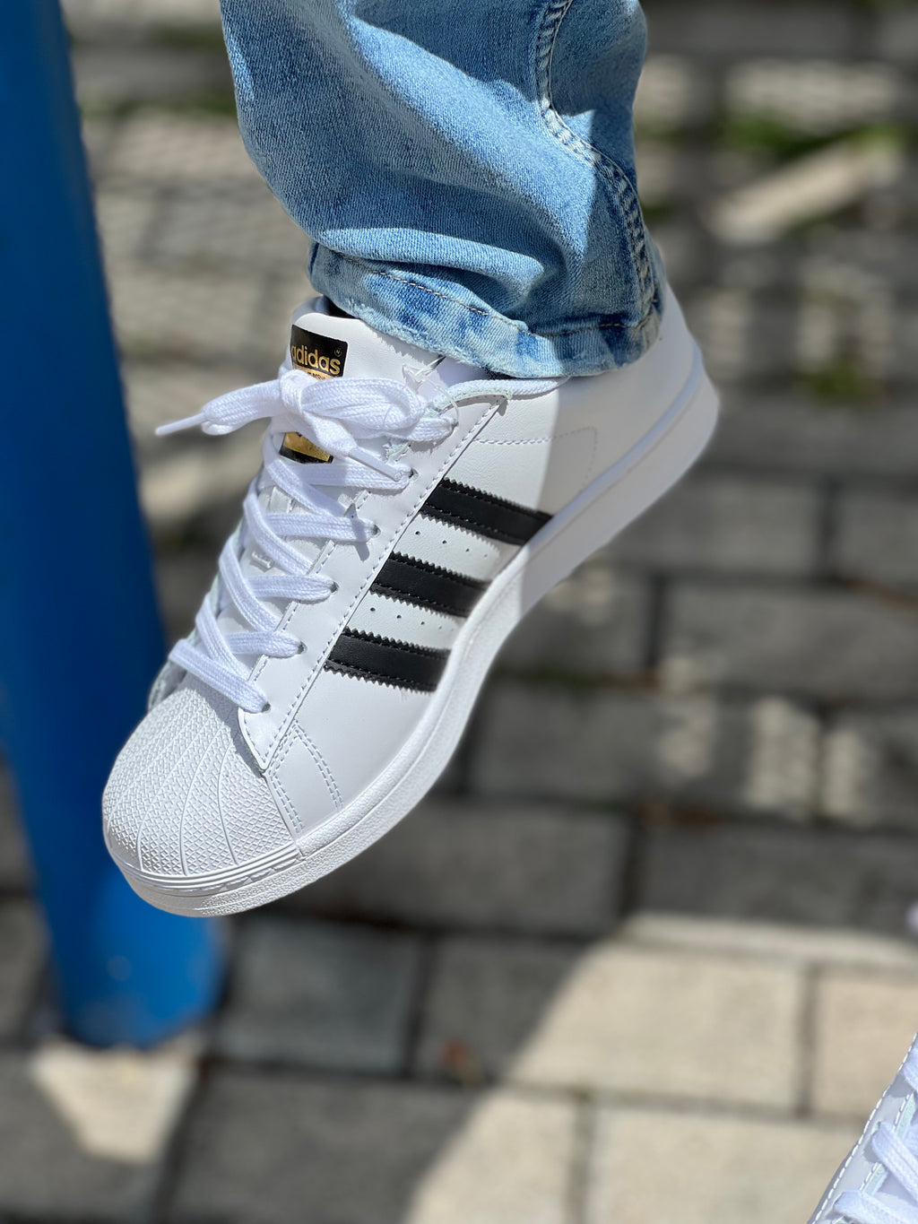 Adidas Superstar in white and black leather