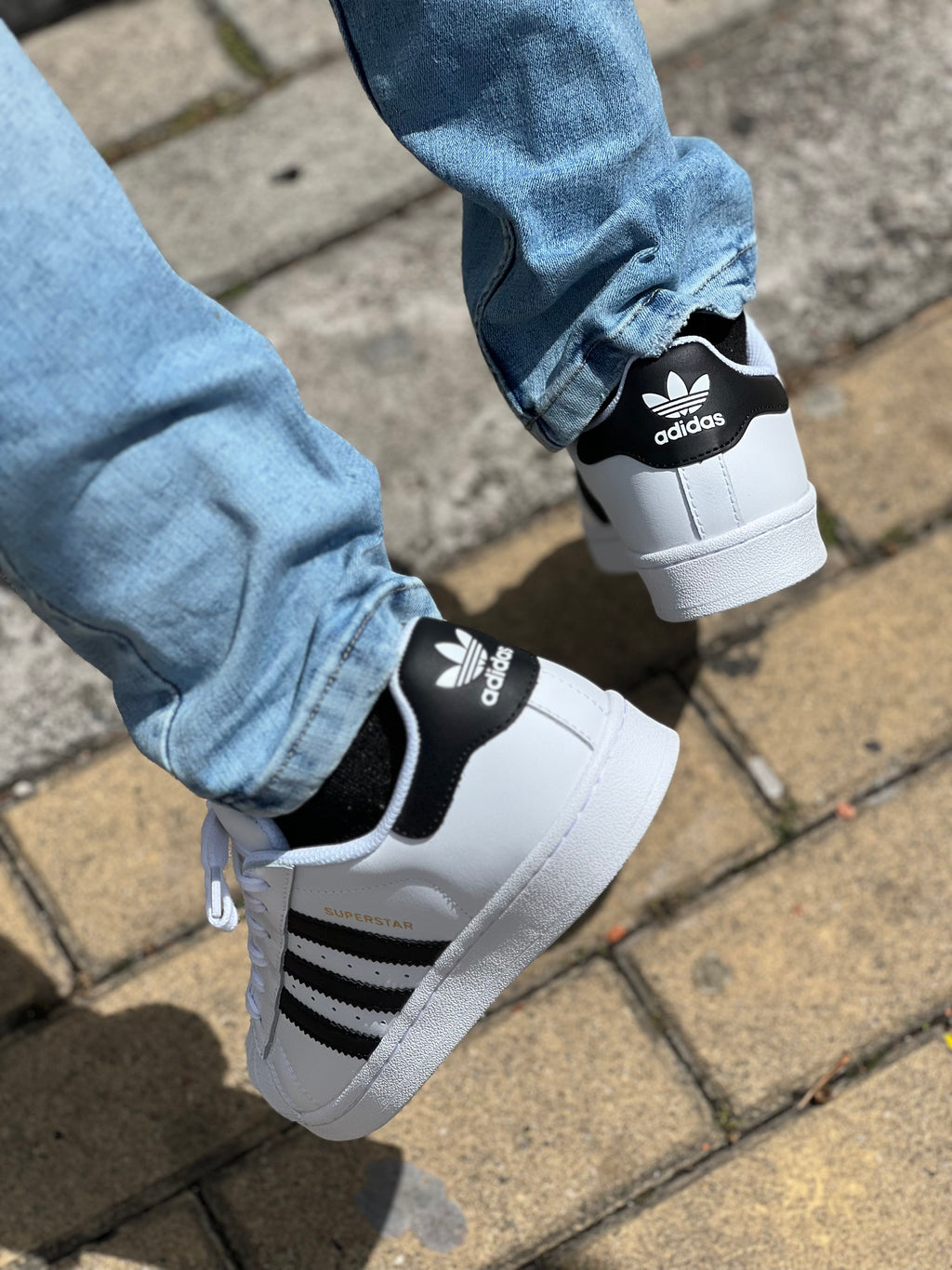 Adidas Superstar in white and black leather