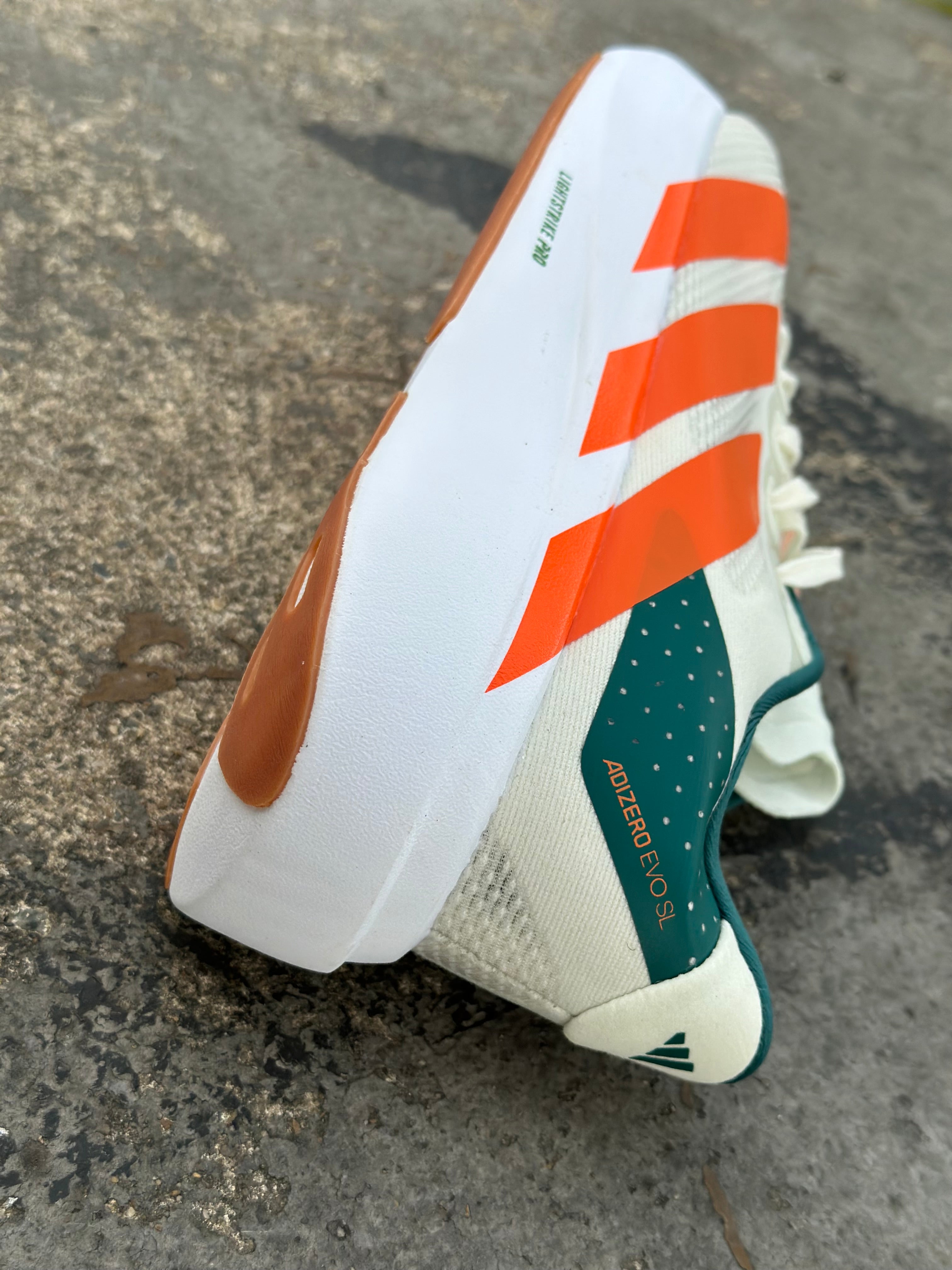 ADIZERO EVO SL BEIGE/NARANJA